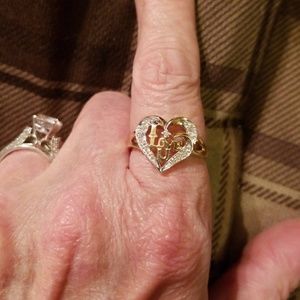 Yes, it is REAL, solid 10k yellow gold ring